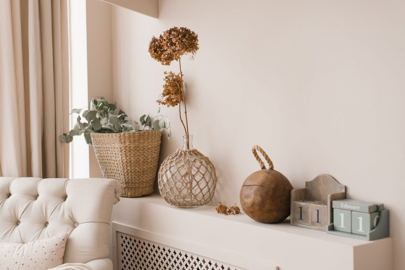 Scandinavian decor as a decoration in the house. Dried hydrangea flowers in a vase